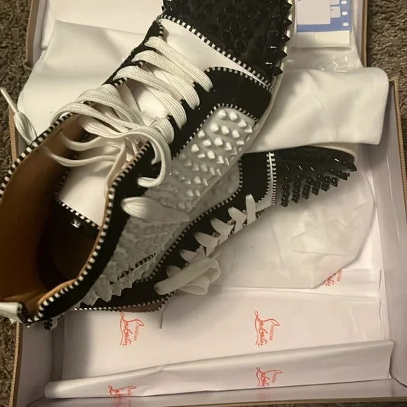 White and black “Christian Louboutin” Louis Flat Calf Spiked. Size 8 1/2.